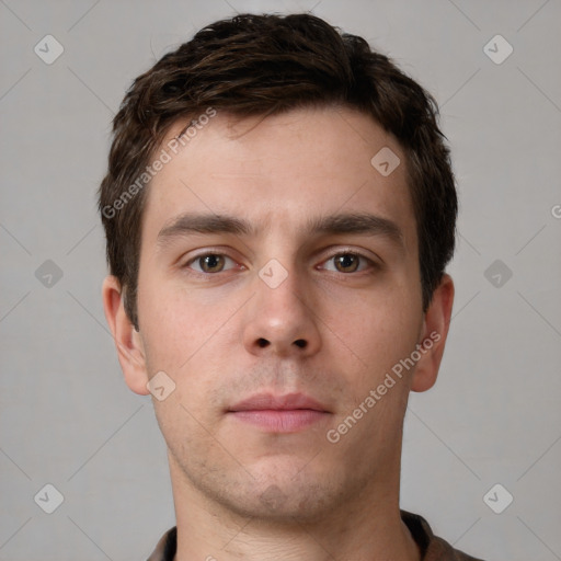 Neutral white young-adult male with short  brown hair and brown eyes