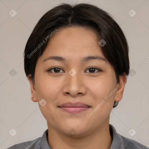 Joyful asian young-adult female with short  brown hair and brown eyes