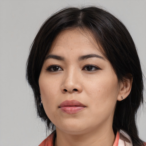 Neutral asian young-adult female with medium  black hair and brown eyes