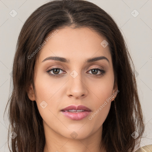 Neutral white young-adult female with long  brown hair and brown eyes