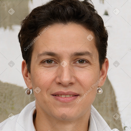 Joyful white adult male with short  brown hair and brown eyes