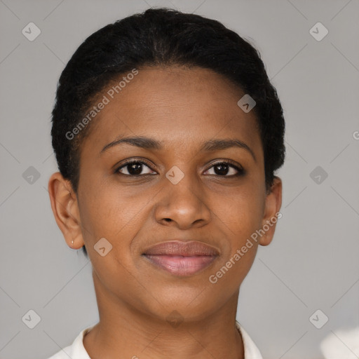 Joyful black young-adult female with short  brown hair and brown eyes