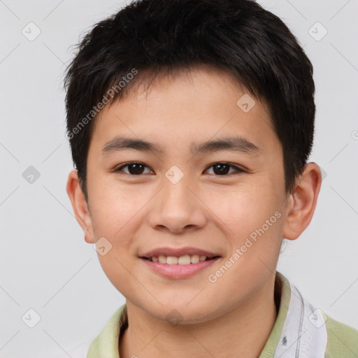 Joyful white child male with short  brown hair and brown eyes