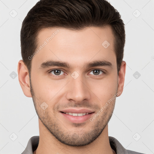 Joyful white young-adult male with short  brown hair and brown eyes