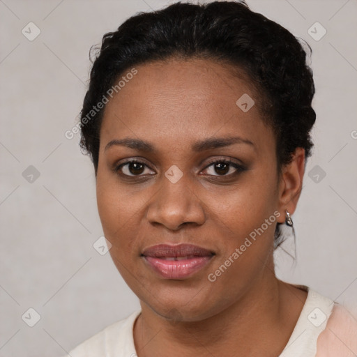 Joyful latino young-adult female with short  black hair and brown eyes