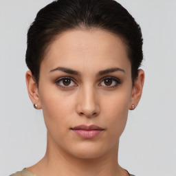 Neutral white young-adult female with short  brown hair and brown eyes