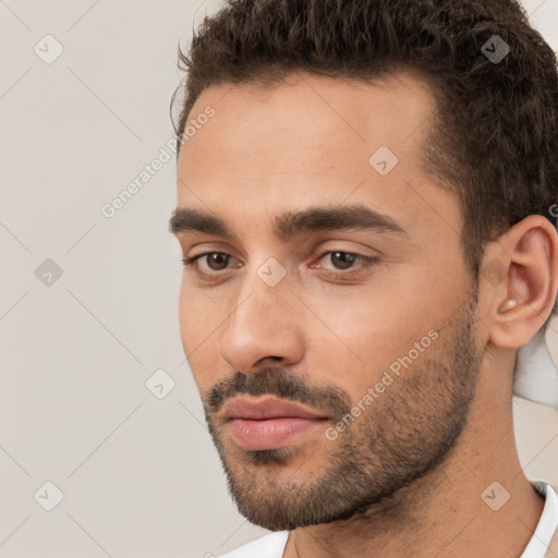 Neutral white young-adult male with short  brown hair and brown eyes