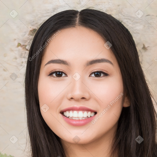 Joyful white young-adult female with long  black hair and brown eyes