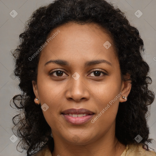 Joyful black young-adult female with medium  brown hair and brown eyes