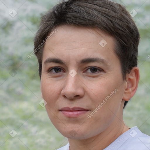 Joyful white adult female with short  brown hair and brown eyes