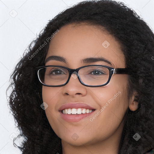 Joyful white young-adult female with long  black hair and brown eyes