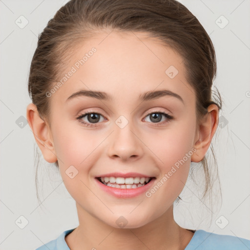 Joyful white child female with medium  brown hair and grey eyes