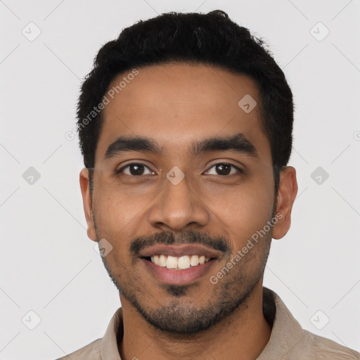 Joyful latino young-adult male with short  black hair and brown eyes