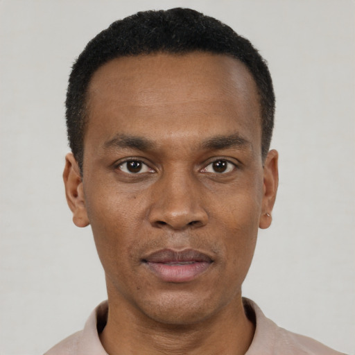 Neutral black young-adult male with short  black hair and brown eyes