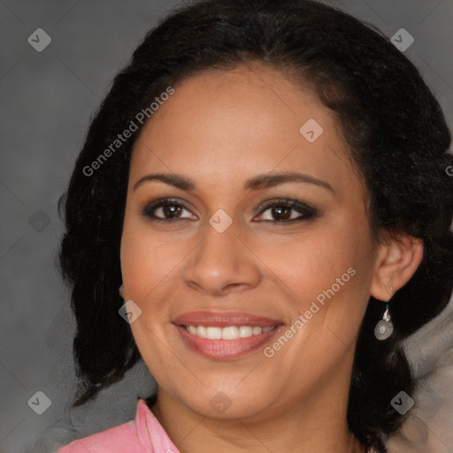 Joyful black young-adult female with long  brown hair and brown eyes