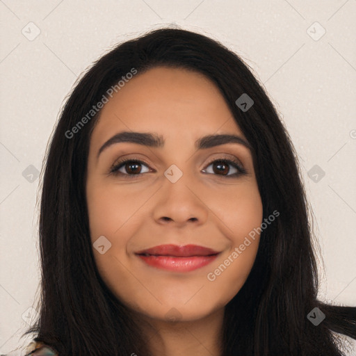 Joyful latino young-adult female with long  black hair and brown eyes