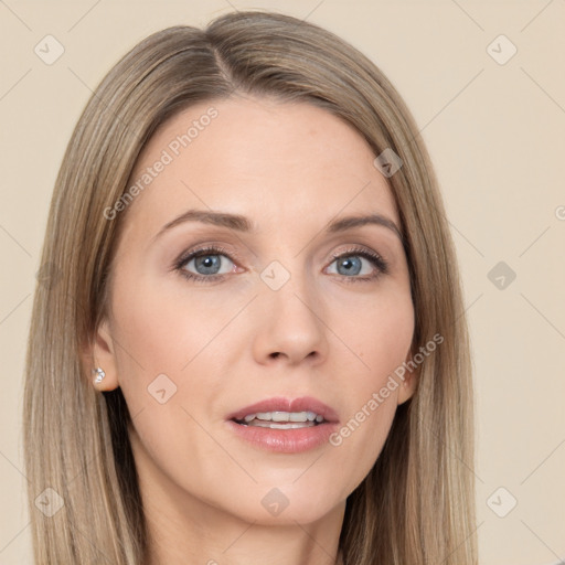 Joyful white adult female with long  brown hair and grey eyes