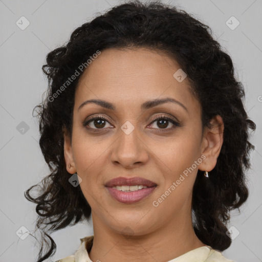 Joyful latino young-adult female with medium  brown hair and brown eyes