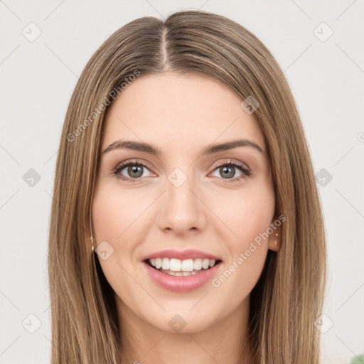 Joyful white young-adult female with long  brown hair and green eyes