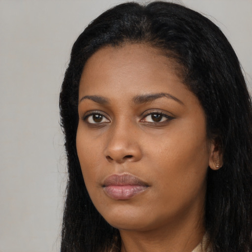 Neutral black young-adult female with long  black hair and brown eyes