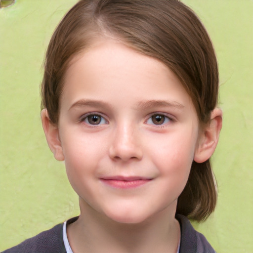 Joyful white child female with short  brown hair and brown eyes