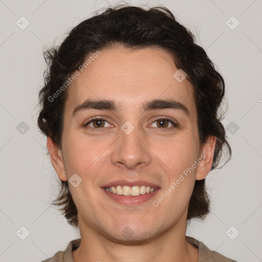 Joyful white young-adult male with medium  brown hair and brown eyes