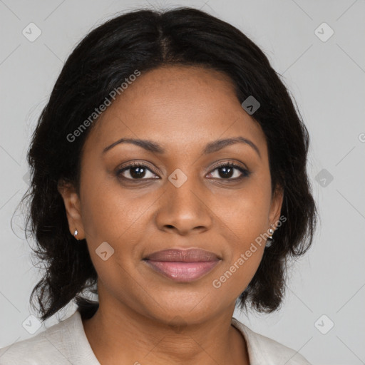 Joyful black young-adult female with medium  brown hair and brown eyes