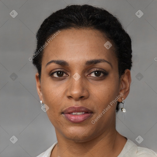 Joyful black young-adult female with short  brown hair and brown eyes