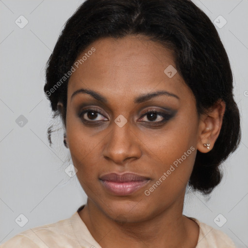 Joyful latino young-adult female with medium  brown hair and brown eyes