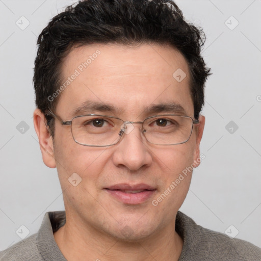 Joyful white adult male with short  brown hair and grey eyes