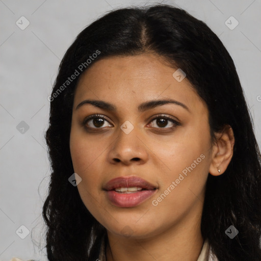 Joyful latino young-adult female with long  black hair and brown eyes