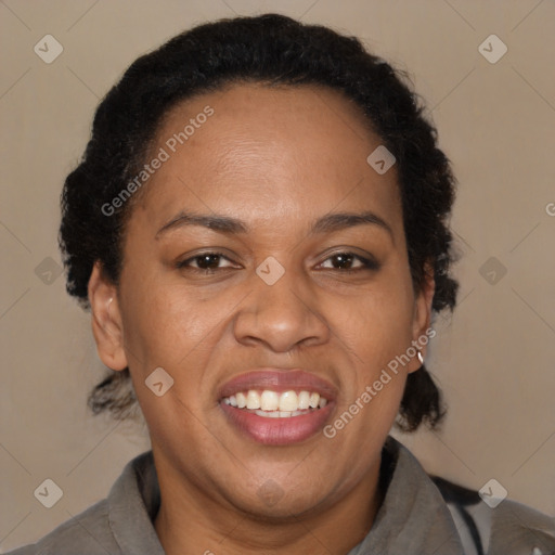 Joyful black adult female with short  brown hair and brown eyes