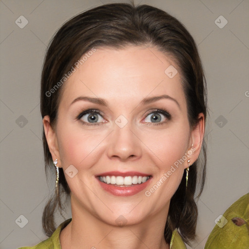 Joyful white young-adult female with medium  brown hair and green eyes