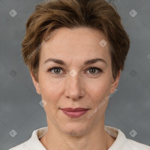 Joyful white adult female with short  brown hair and grey eyes