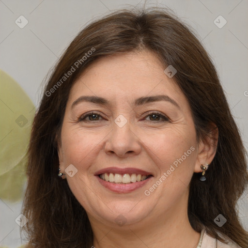 Joyful white adult female with medium  brown hair and brown eyes