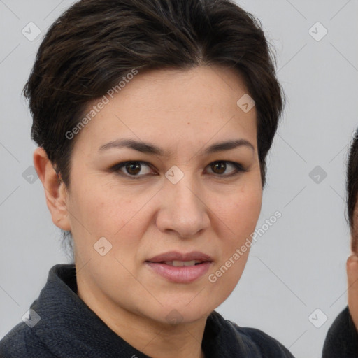 Joyful white adult female with short  brown hair and brown eyes