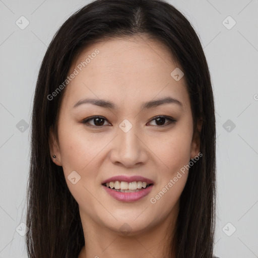 Joyful latino young-adult female with long  brown hair and brown eyes