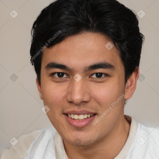 Joyful latino young-adult male with short  brown hair and brown eyes