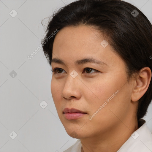 Neutral white young-adult female with short  brown hair and brown eyes