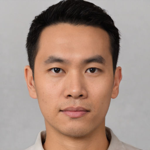 Neutral asian young-adult male with short  black hair and brown eyes
