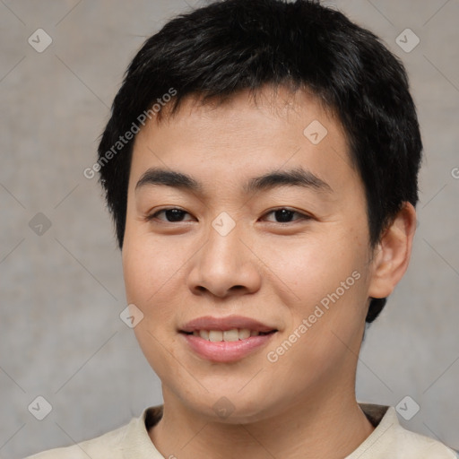 Joyful asian young-adult male with short  brown hair and brown eyes