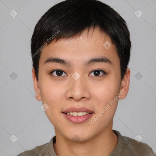 Joyful asian young-adult male with short  black hair and brown eyes