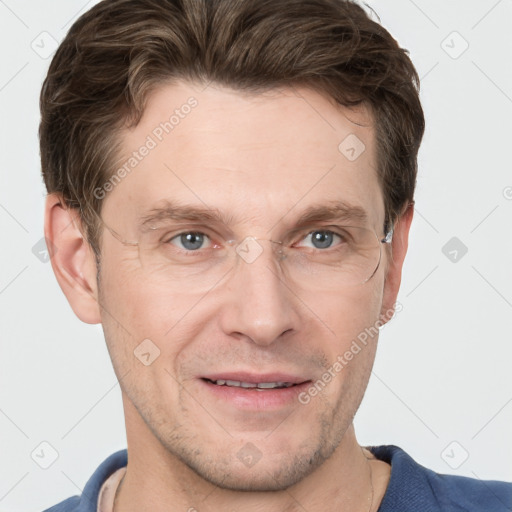 Joyful white adult male with short  brown hair and grey eyes