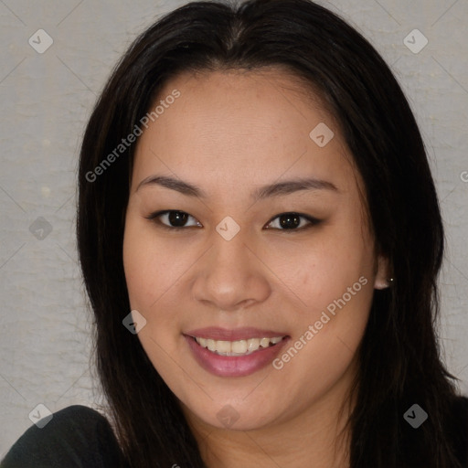 Joyful asian young-adult female with long  brown hair and brown eyes