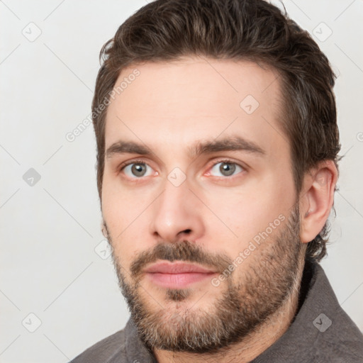 Neutral white young-adult male with short  brown hair and brown eyes