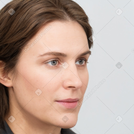 Neutral white young-adult female with long  brown hair and grey eyes