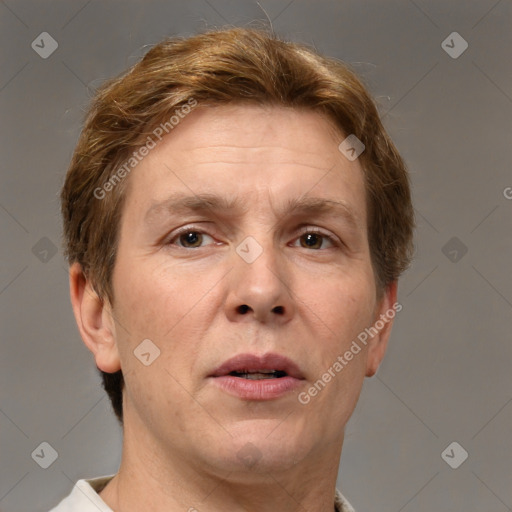 Joyful white adult male with short  brown hair and grey eyes