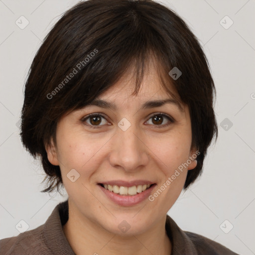 Joyful white adult female with medium  brown hair and brown eyes