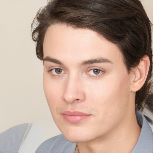 Neutral white young-adult male with medium  brown hair and brown eyes