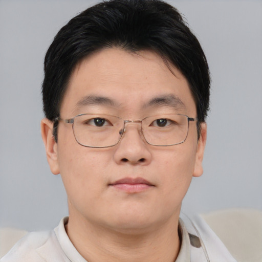Neutral asian young-adult male with short  brown hair and brown eyes